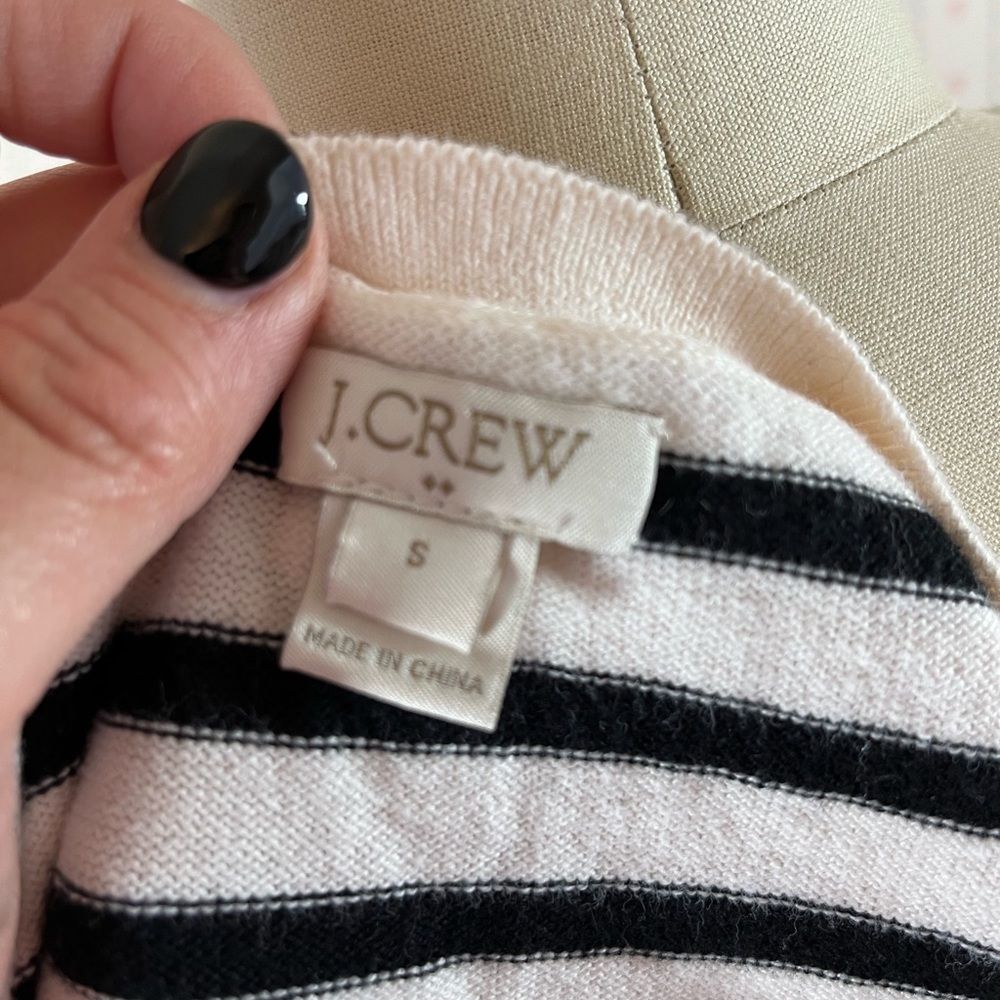 This is a nice little Spring J.Crew sweater. It has a bird on it.